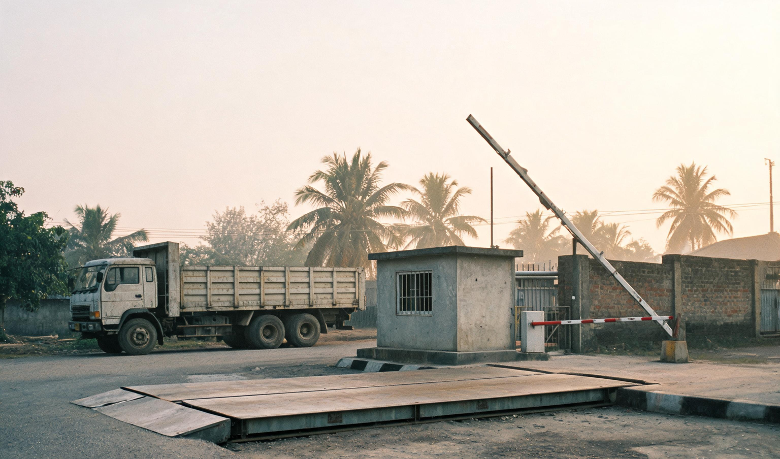 Weighbridge and gate cabin at a Tamil Nadu factory, where a concurrent audit traces material from gate to dispatch